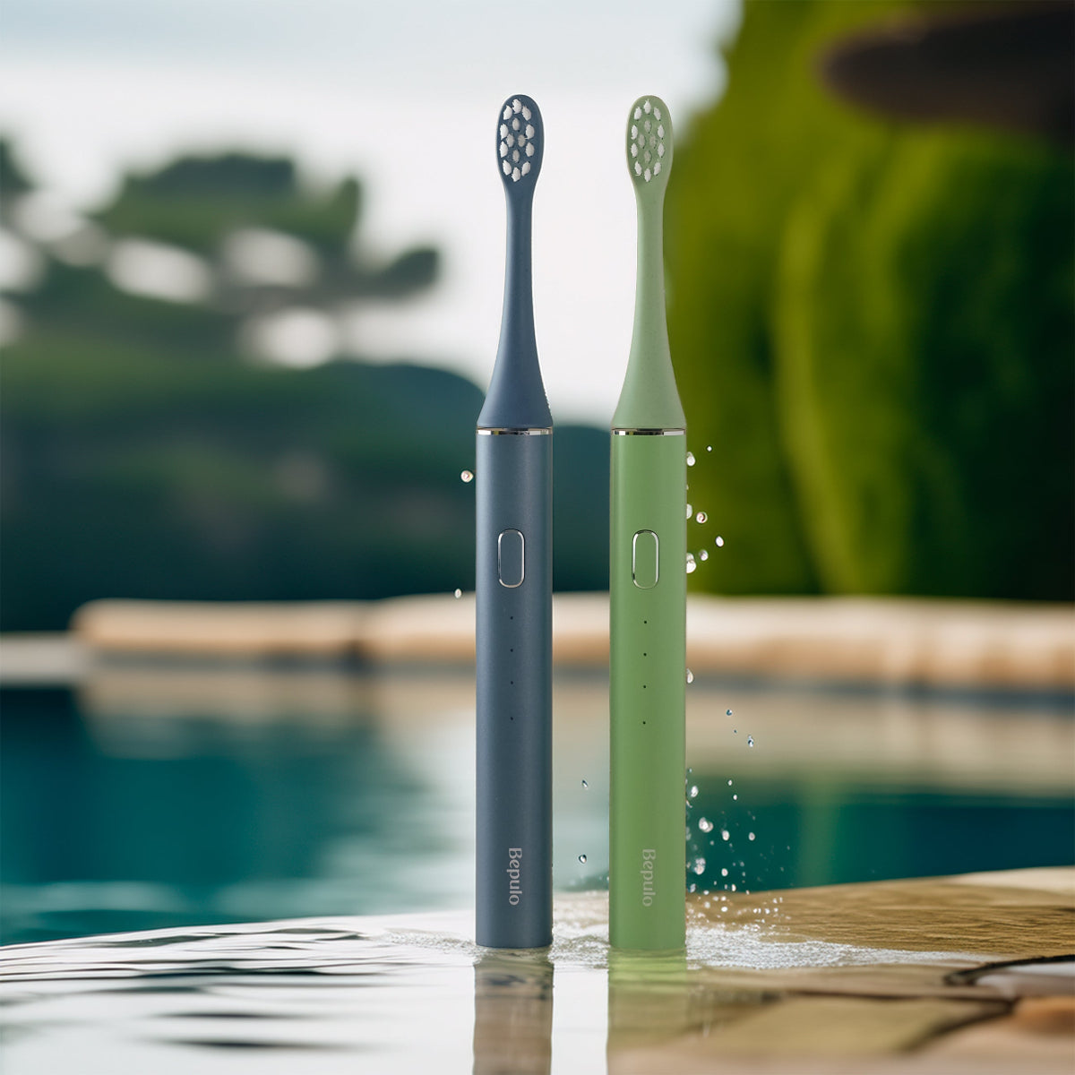 Two Bepulo Next sonic electric toothbrushes standing by a pool. #colour_sapphire blue and pistachio green