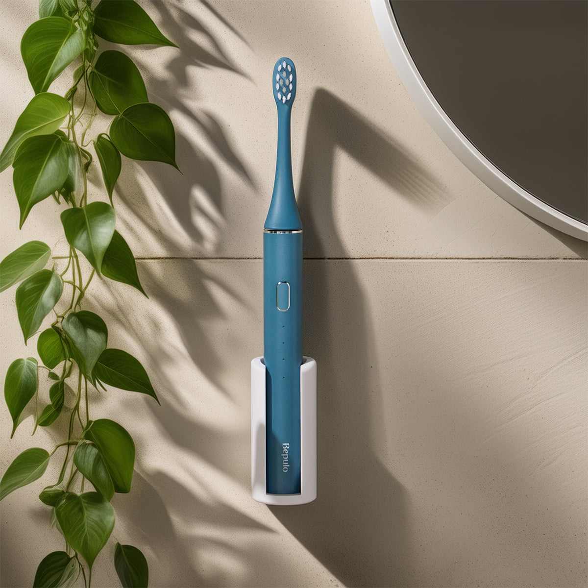 Bepulo Sapphire Blue sonic electric toothbrush mounted on a bathroom wall holder next to a vanity sink. #colour_sapphire blue