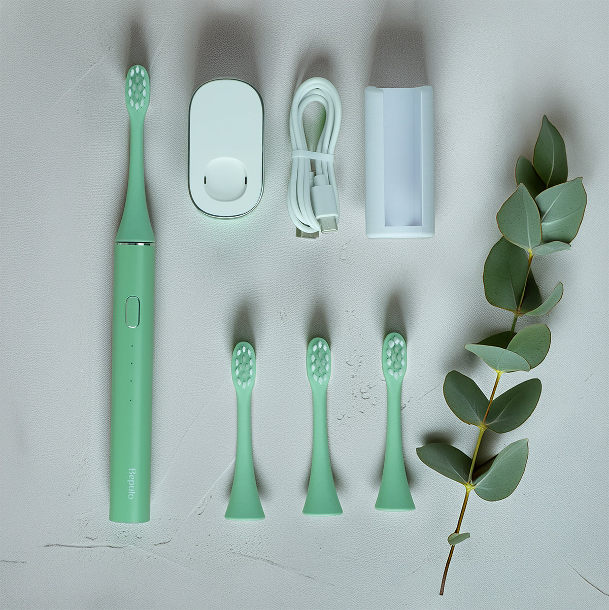Bepulo Next sonic electric toothbrush care bundle in pistachio green with replacement heads. #colour_pistachio green